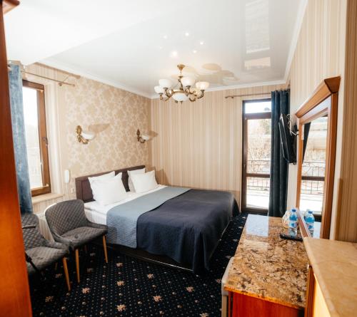 Ένα ή περισσότερα κρεβάτια σε δωμάτιο στο Hotel Afrodita