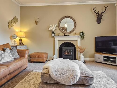 Телевизор и/или развлекательный центр в Antfield House