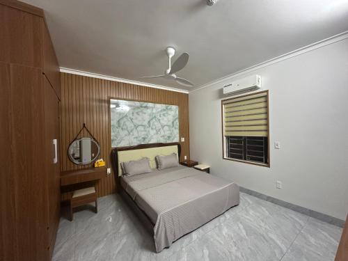 Postel nebo postele na pokoji v ubytování Homestay Thế Anh