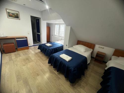 Ένα ή περισσότερα κρεβάτια σε δωμάτιο στο Pensiunea Relax