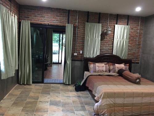 Ένα ή περισσότερα κρεβάτια σε δωμάτιο στο Peaceful house surrounding by nature