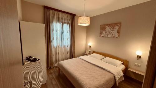 Ένα ή περισσότερα κρεβάτια σε δωμάτιο στο Central Station Apartments