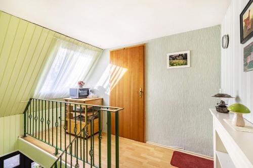 a room with a staircase with a door at Ferienwohnung Für Monteure in Beutel