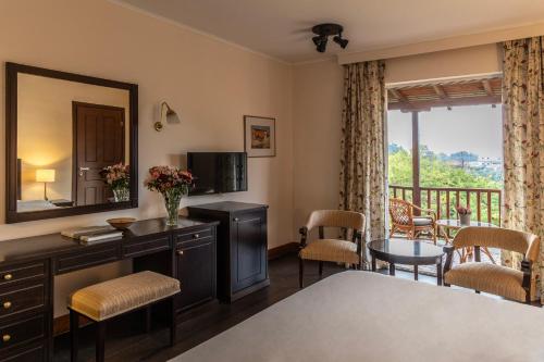 Ένα ή περισσότερα κρεβάτια σε δωμάτιο στο Amalia Hotel Meteora