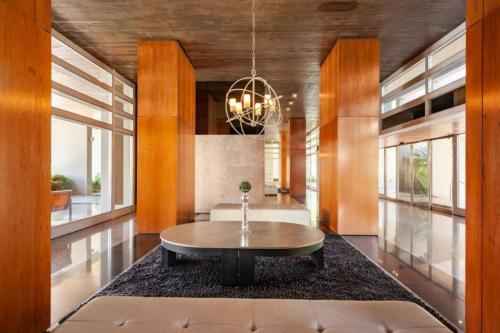 a living room with a table and a couch at San Telmo Suites 12 in Buenos Aires