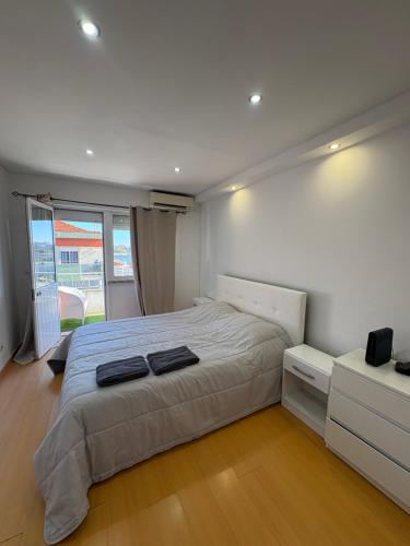 Ένα ή περισσότερα κρεβάτια σε δωμάτιο στο Quarto Relaxante e Agradável