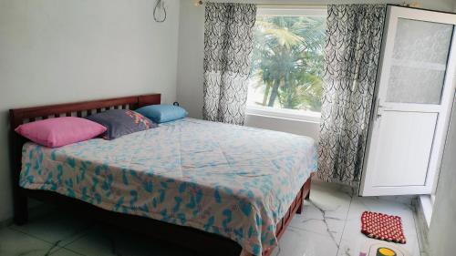 Postel nebo postele na pokoji v ubytování Marari stella vich villa Homestay