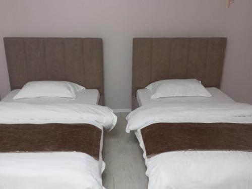 Postel nebo postele na pokoji v ubytování Махаббат