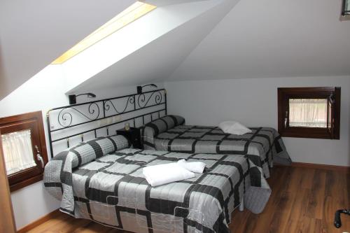 Postel nebo postele na pokoji v ubytování La Cantina del Tobero