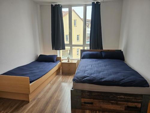 Ένα ή περισσότερα κρεβάτια σε δωμάτιο στο Döbeln ,Unterkunft für Montagen Arbeiter & Familien