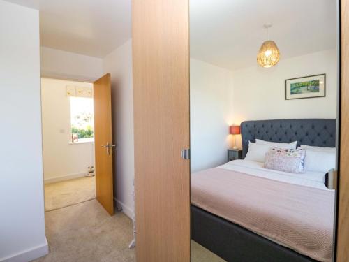 Ένα ή περισσότερα κρεβάτια σε δωμάτιο στο Oversands View