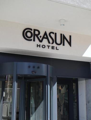 a sign for a cabin hotel on a building at Cora Sun Apart-Hotel in St. Paul's Bay