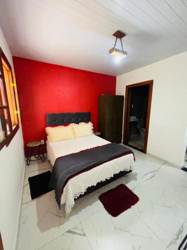 Postel nebo postele na pokoji v ubytování Chalé Três Marias