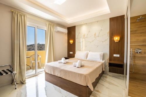 Ένα ή περισσότερα κρεβάτια σε δωμάτιο στο Mikes Apts