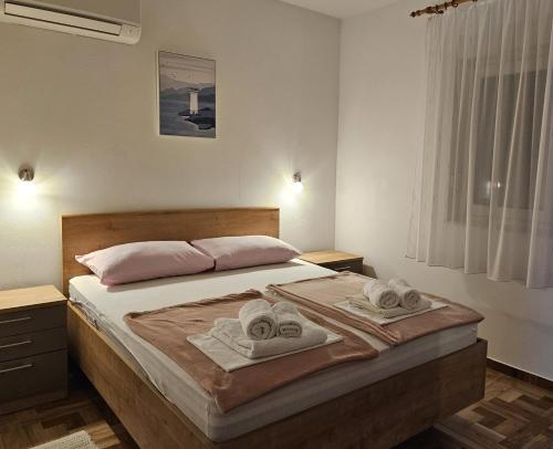 Ένα ή περισσότερα κρεβάτια σε δωμάτιο στο IVAN