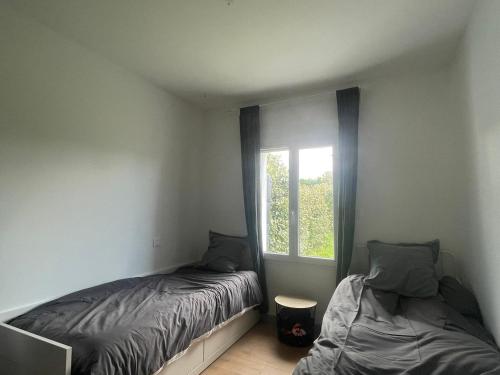 Ένα ή περισσότερα κρεβάτια σε δωμάτιο στο Welcome to Najat's