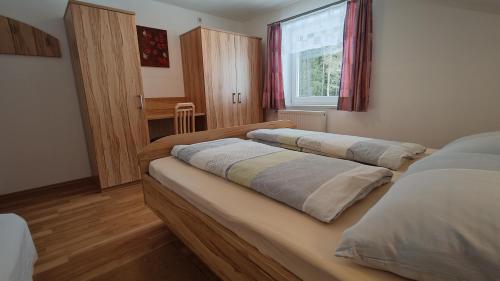 Postel nebo postele na pokoji v ubytování Haus GANZER
