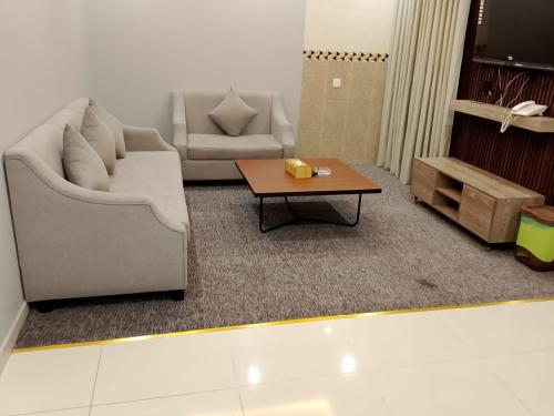 Zona de estar de راحتي هنا 7