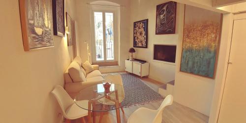 Khu vực ghế ngồi tại San Pietro Luxury Old Town Apartment