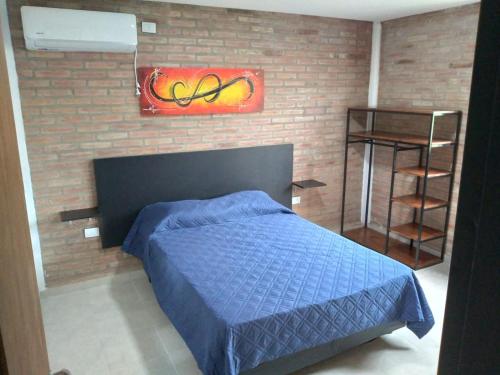 Postel nebo postele na pokoji v ubytování El Atardecer de Playas de Oro