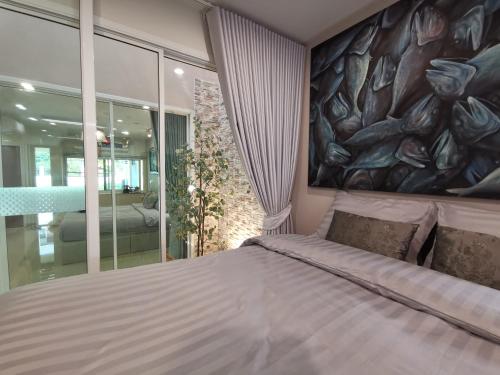 Postel nebo postele na pokoji v ubytování Home Base at Krabi