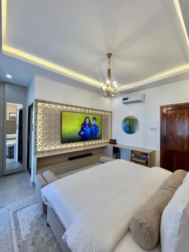 Ένα ή περισσότερα κρεβάτια σε δωμάτιο στο Adiya Home Next to Ferry & Forodhani Stone-town