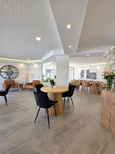 Area soggiorno di White Cottage Guesthouse