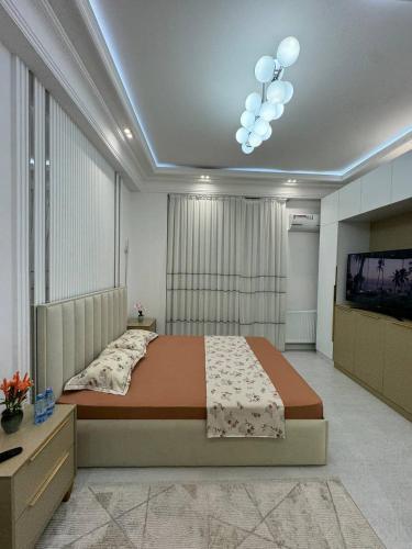 Ένα ή περισσότερα κρεβάτια σε δωμάτιο στο Dream Lux Apartment