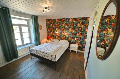 Postel nebo postele na pokoji v ubytování Le Presbytère