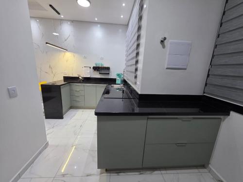 Køkken eller tekøkken på Conforto, Balão & Paraquedas