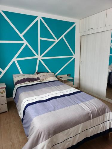 Ένα ή περισσότερα κρεβάτια σε δωμάτιο στο Departamento de estreno perfecto para veranear