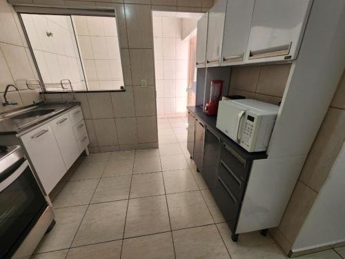 Nhà bếp/bếp nhỏ tại Ap térreo no coração de Boituva