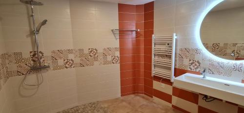 Et badeværelse på Gîte La Ferme Du Mesnil