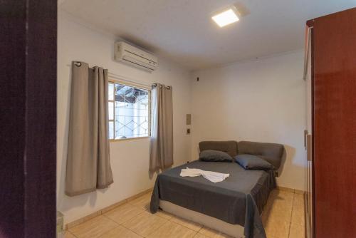 Khu vực ghế ngồi tại Casa com Piscina e Churrasqueira no Parque Fehr