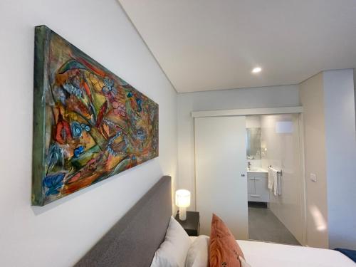 En eller flere senge i et værelse på MyStay Porto Urban Park