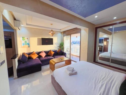 Una cama o camas en una habitación de Puerto Marina APARTHOTEL