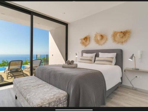 Ένα ή περισσότερα κρεβάτια σε δωμάτιο στο Villa Rubydom