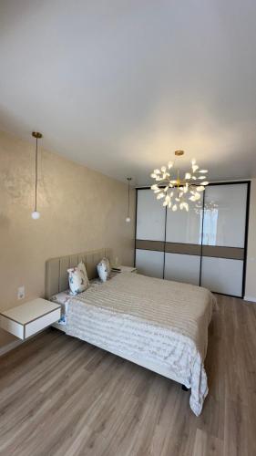 Ένα ή περισσότερα κρεβάτια σε δωμάτιο στο Great House АВТОвокзал