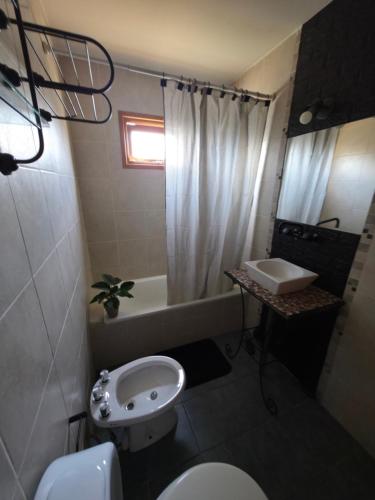 Koupelna v ubytování Temporario RG