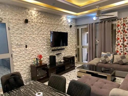 Televisor o centre d'entreteniment de Résidence Bonheur