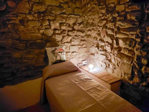 Ένα ή περισσότερα κρεβάτια σε δωμάτιο στο La Dimora di Dida