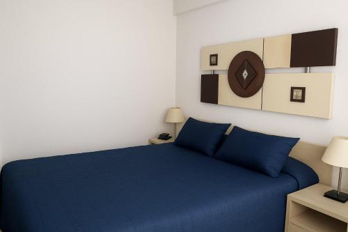 En eller flere senge i et værelse på Campinas - Conforto e Praticidade: 02 Hóspedes