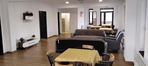 Posezení v ubytování Pensiunea Bălcești Beliș Apuseni