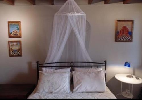 Ένα ή περισσότερα κρεβάτια σε δωμάτιο στο House of Thaleia