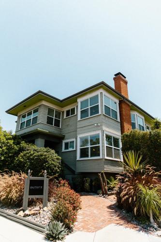 a large house with a sign in front of it at Outsite San Diego - Golden Hill in San Diego