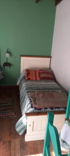 Postel nebo postele na pokoji v ubytování Cabañas Aneley