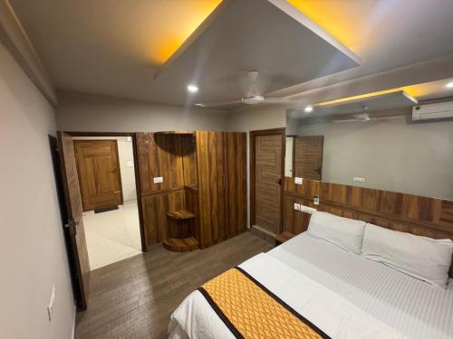 Ένα ή περισσότερα κρεβάτια σε δωμάτιο στο Nova Regency