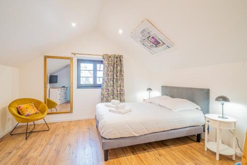 En eller flere senge i et værelse på The Gingerbread Spa - Private Parking - Terrace