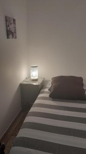 Una cama o camas en una habitación de Gîte LE Rebattu