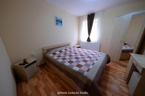 En eller flere senge i et værelse på Cabana Schinda